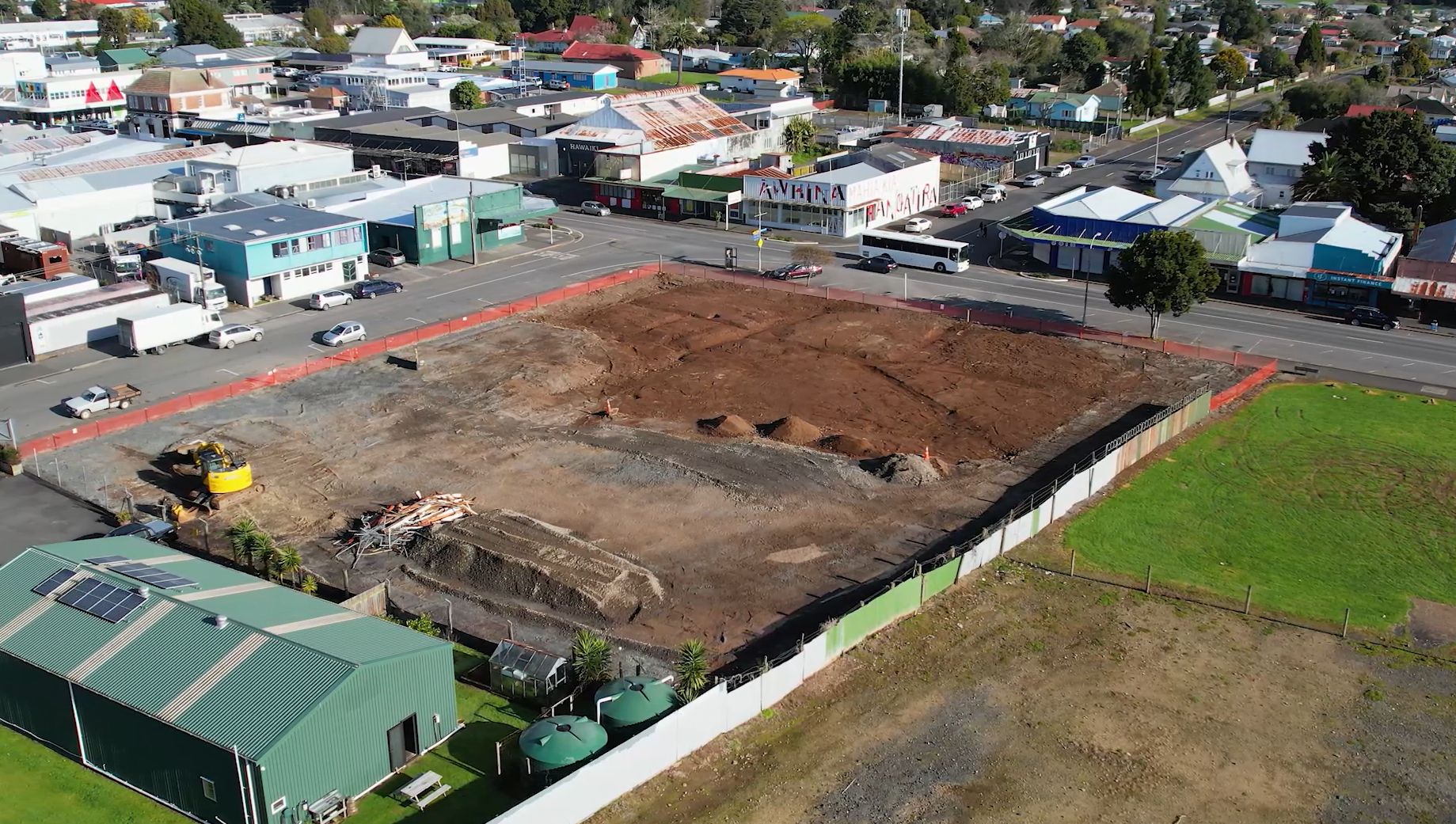 Drone of cleared site from behind looking towards Broadway